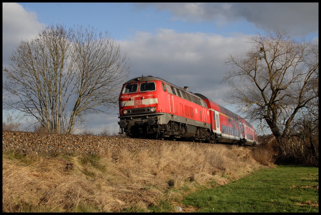 218 410-9 mit einem IRE von Lindau nach Ulm bei Langenargen, 14.01.12