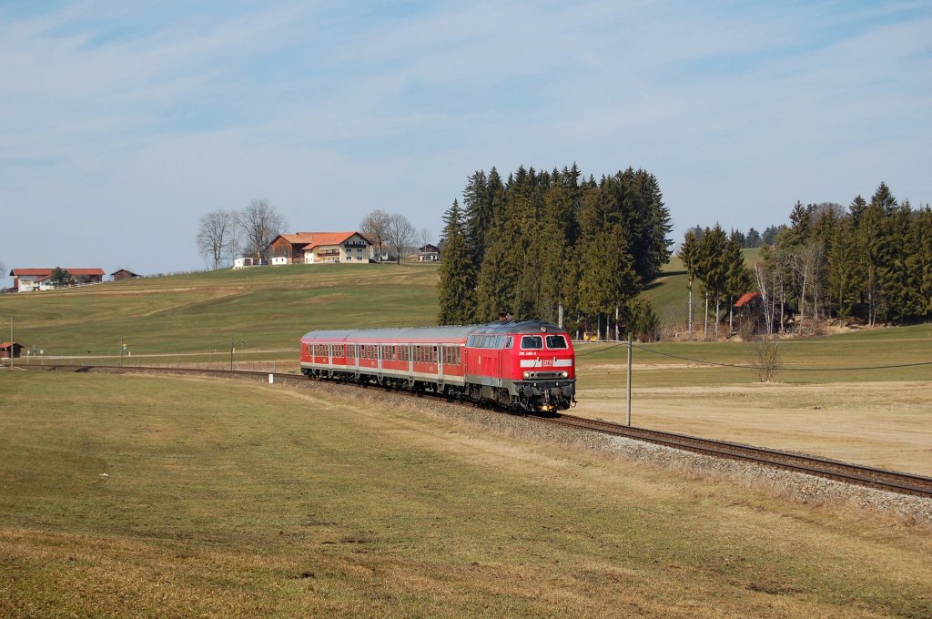 218 488-5 mi RE 57506 Mnchen Hbf - Fssen, strebt dem Endziel Fssen entgegen. (17.03.2012)