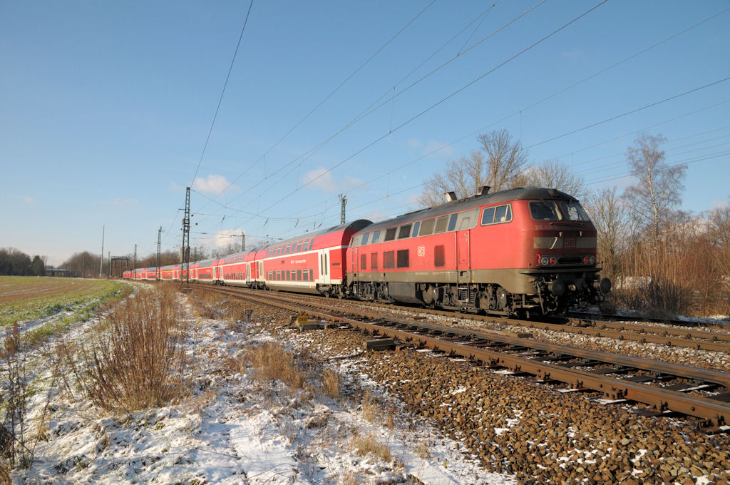 218428 schiebt am 27.11.10 die RB nach Mnchen in Riem