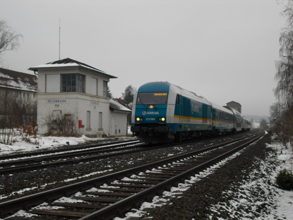 223 068 fhrt am 15.02.11 mit dem ALX durch Pechbrunn Richtung Mnchen.