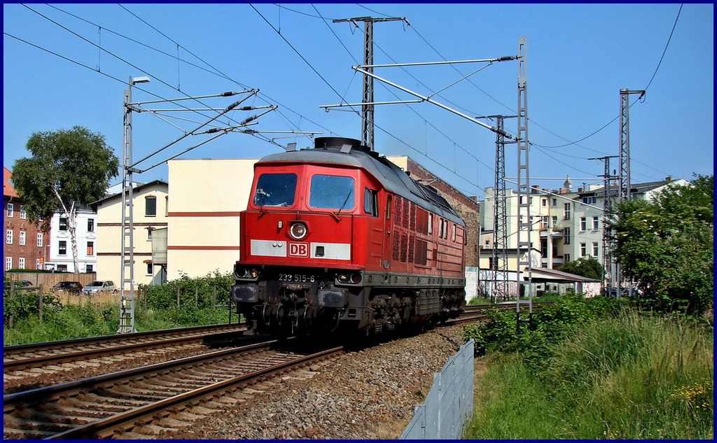 233 515-6 Tfzf in Richtung Rostock.  Kurz hinter dem Hbf Stralsund am  09.07.10 