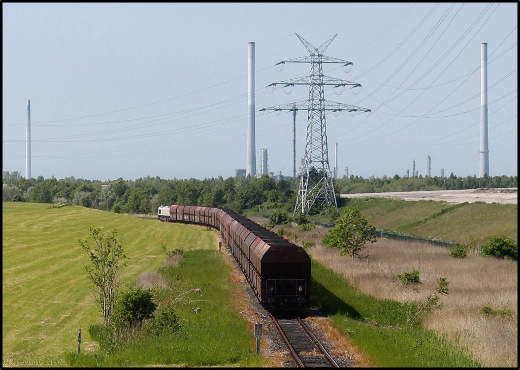 247 011-0 der Euro Cargo Rail kommend vom Massenschttgutlager mit Ihren Kohlewagen unterwegs auf dem Nordgleis in Wilhelmshaven. 07/06/2013