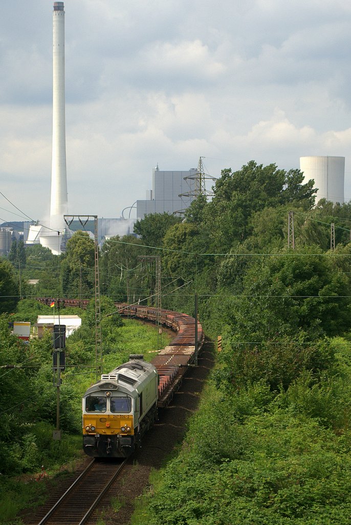 247 034 befuhr am 17.07.2012 vor der Kulisse des STEAG-Kraftwerks Herne die Verbindungskurve von Wanne-Eickel Hbf. richtung BO-Riemke.