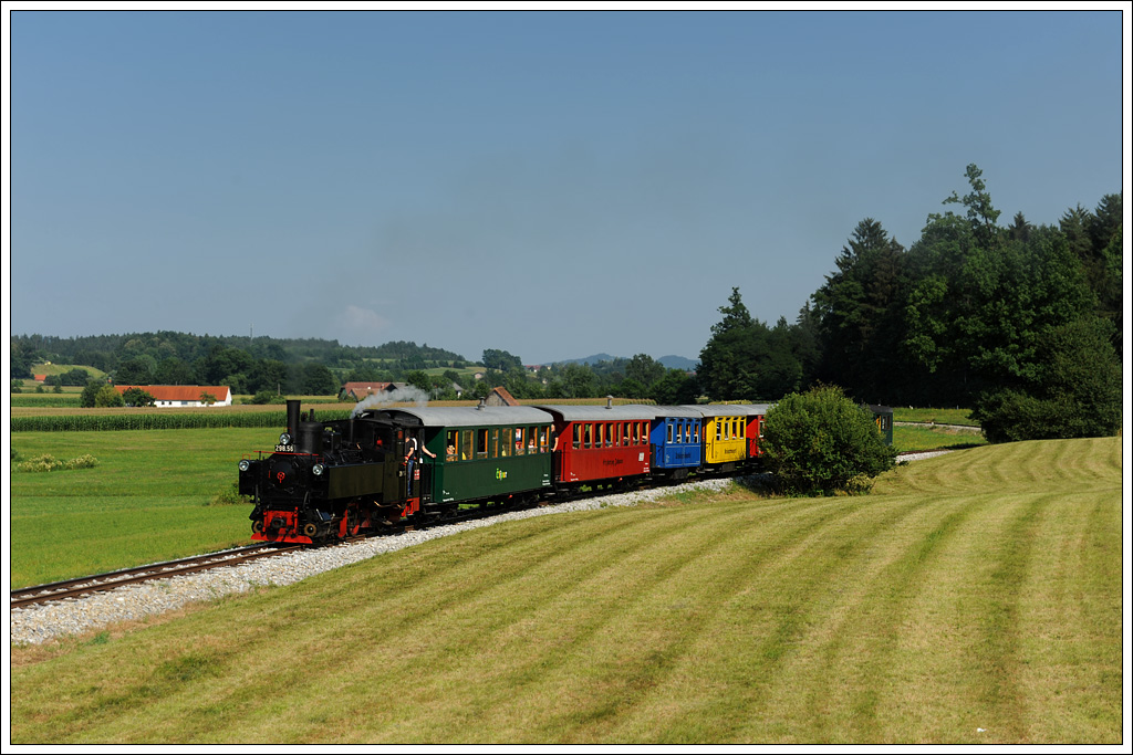 298.56 mit dem Stainzer Flascherlzug am 10.7.2011 kurz vor Herbersdorf aufgenommen.