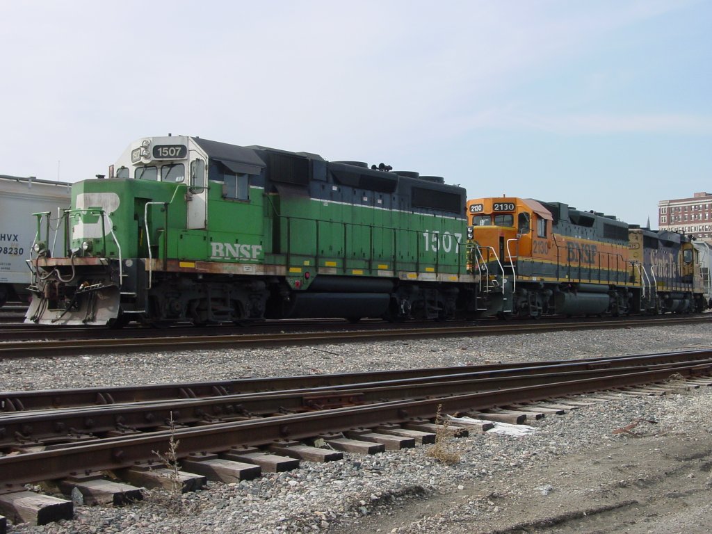 3 paint schemes! Left, BN 1507, middle BNSF Heritage II 2130, right Santa Fe 2475? in Burlington, Iowa 27 Feb 2006 being used as switch engines to build a freight train.