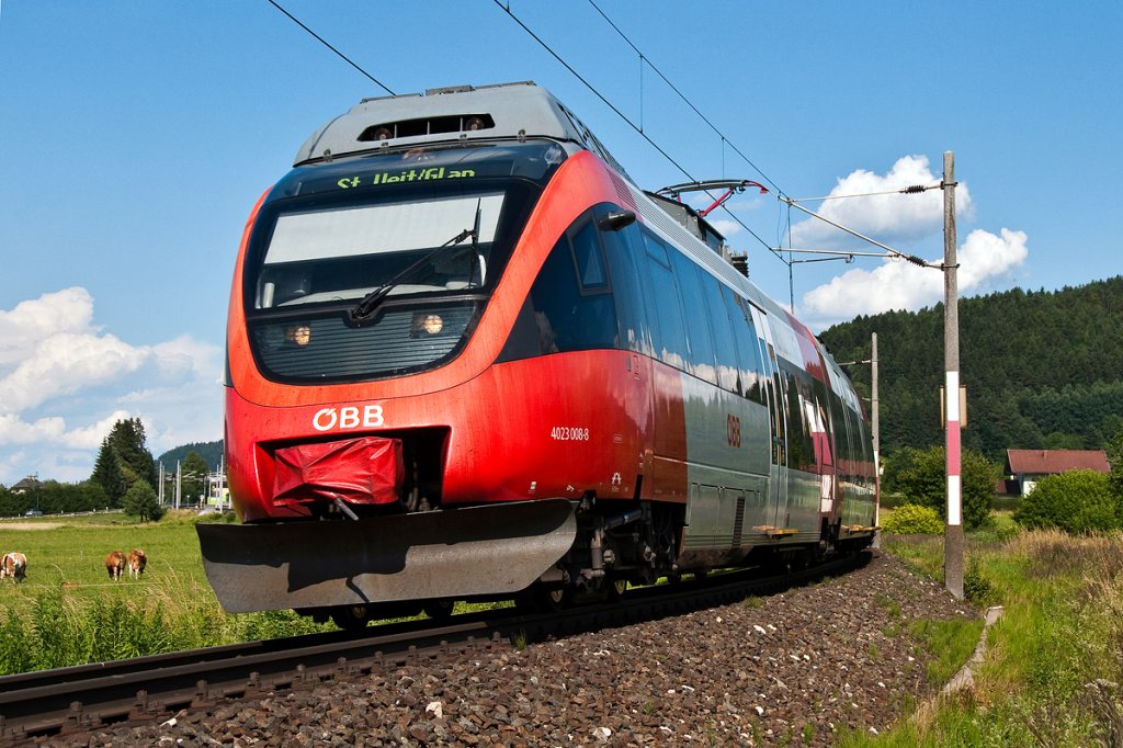 4023 008 als S Bahn 4316 von Rosenbach nach St. Veit an der Glan unterwegs. Die Aufnahme enstand am 02.07.2013 zwischen Faak am See und Finkenstein.