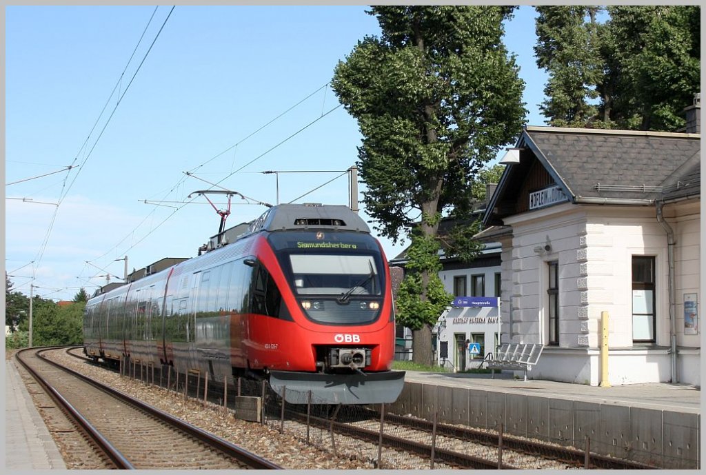 4024 126-7 als R 2176 bei der Durchfahrt in Hflein/Donau. 19.06.11