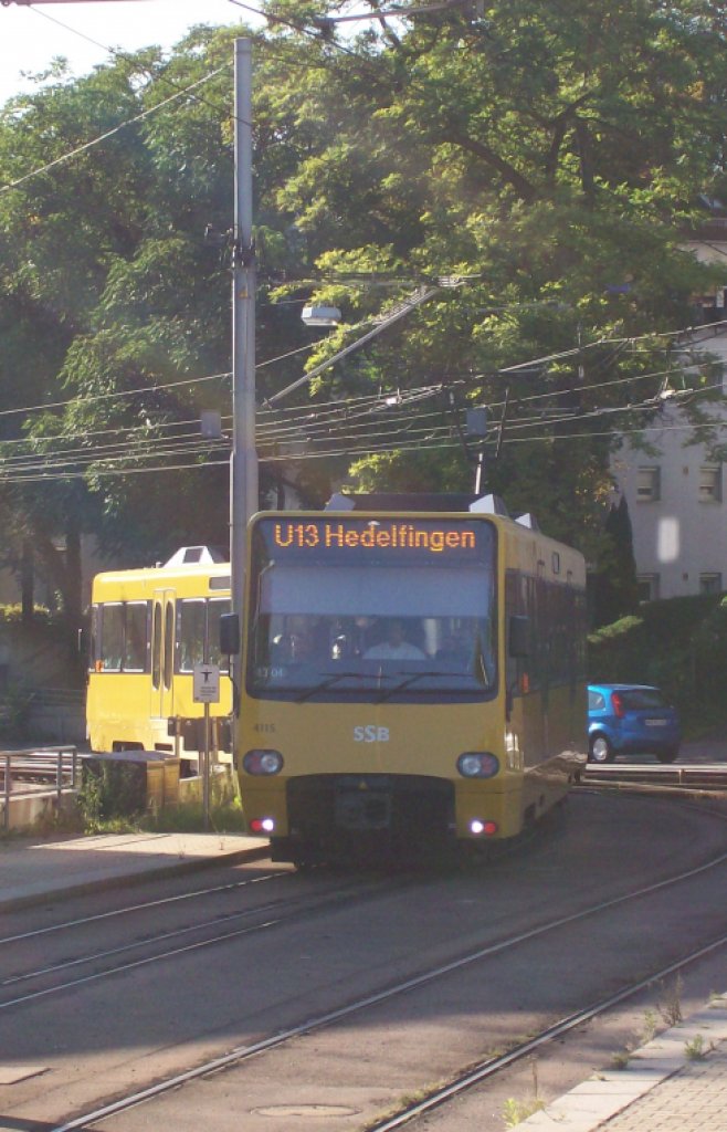 4115/4116 der SSB als U13 Hedelfingen Kurs: 13-04 am 15.09.2011 bei durchfahrt an der ehemaligen Haltestelle Stuttgart - Augsburger Platz von der Haltestelle Stuttgart - Uff-Kirchhof Richtung der neuen Haltestelle: Stuttgart - Ebitzweg. 
