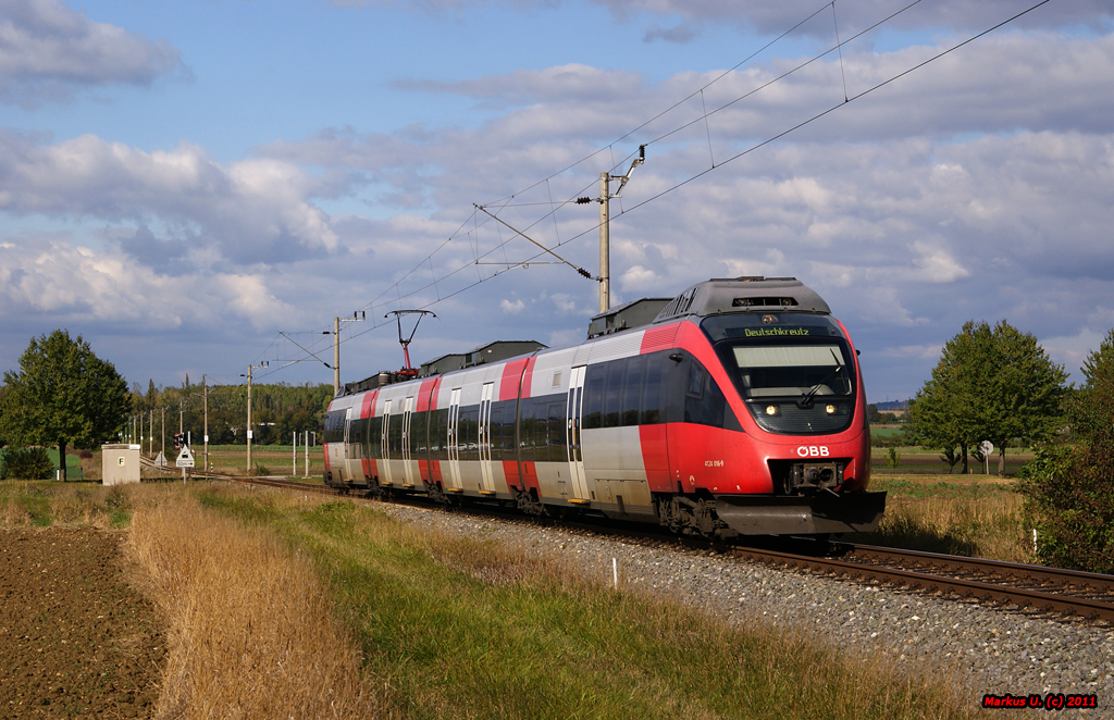 4124 016 als REX2823(Wien Meiding-Deutschkreutz), kurz vor dem Zugendbahnhof, 14.10.2011.