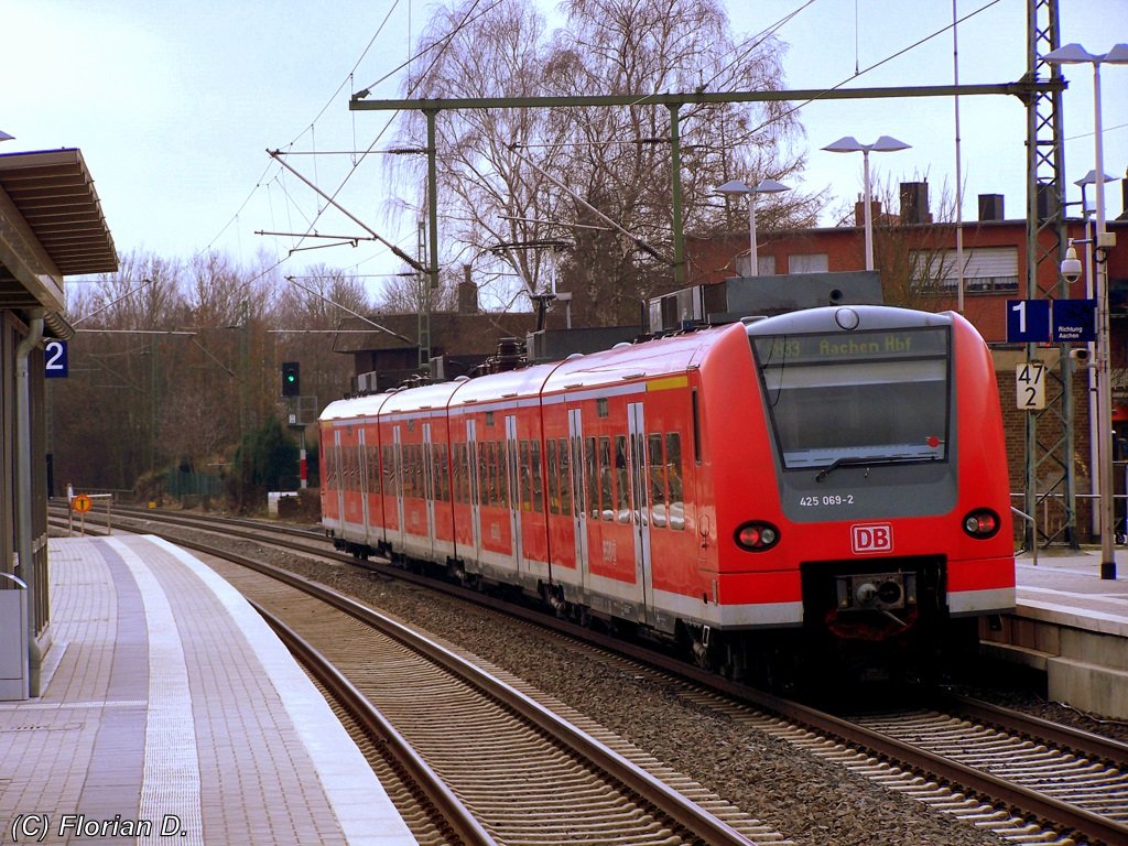 425 069/569 verl�sst als 11071(RB33), aus Duisburg kommend, den Erkelenzer Bahnhof in Richtung Aachen Hbf am 16.03.2010