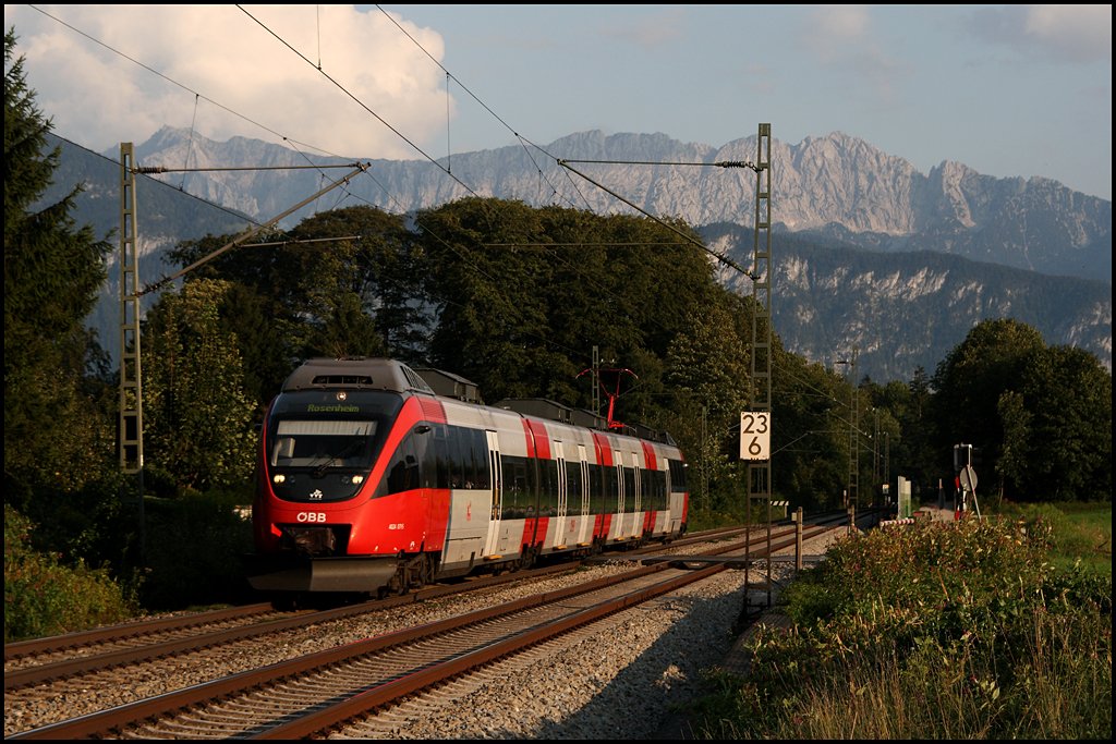 425 071 ist als RB 5126, nach Rosenheim unterwegs. (Kloster Raisach am Abend des 07.08.2009)