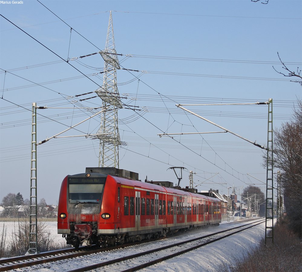 425 073 als RB11069 nach Aachen an der ehem. Anrufschranke in Geilenkirchen 4.1.2010