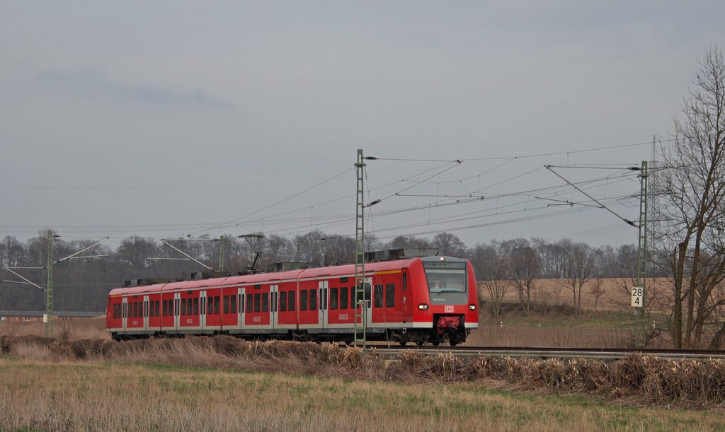 425 075-9 als RB11075 (+5) nach Aachen an Km 28.4 der KBS 485 23.3.10