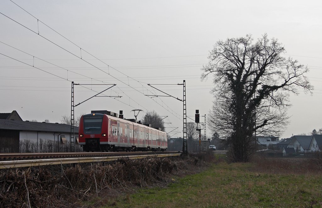 425 076-7 als RB11074 (+5) nach Duisburg an Km 28.3 der KBS485 23.3.10