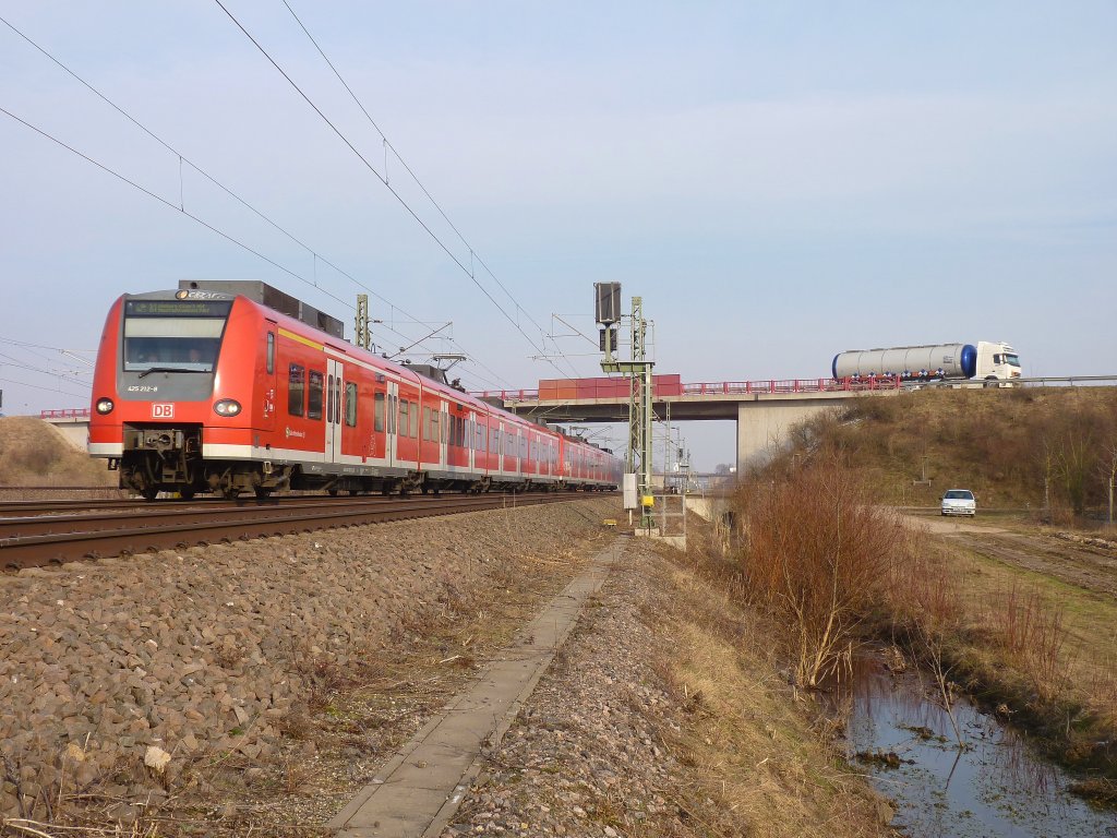 425 212 am 23.2.11 als S1 nach Homburg (Saar) bei Bhl-Iggelheim.