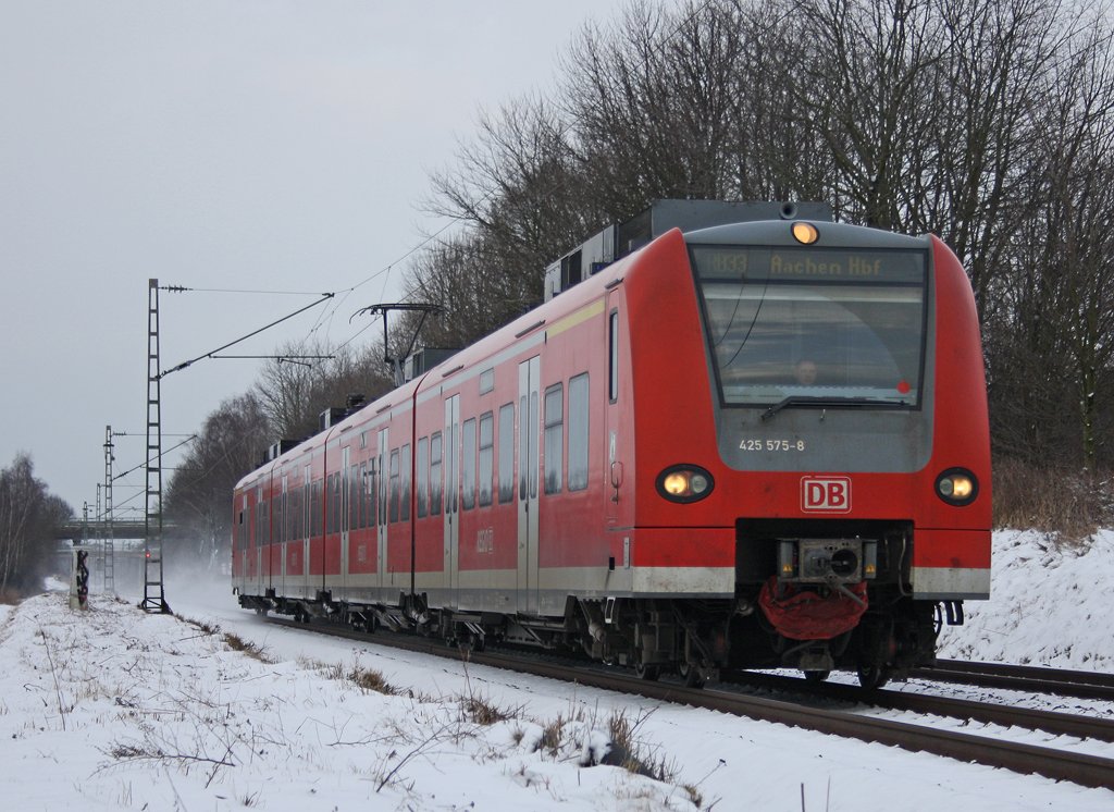 425 575 als RB33  Rhein-Niers-Bahn  aus Duisburg nach Aachen zwischen Geilenkirchen und bach am Km 25.6 31.1.2010