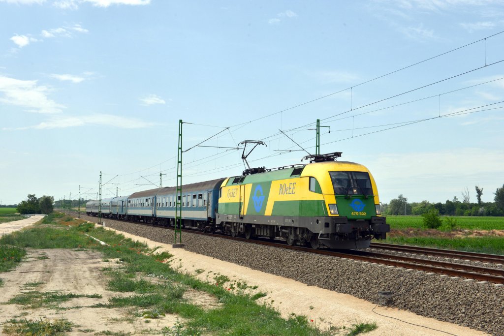 470 502 mit D 907 nach Budapest Dli am 09.06.2012 unterwegs bei Trnok.