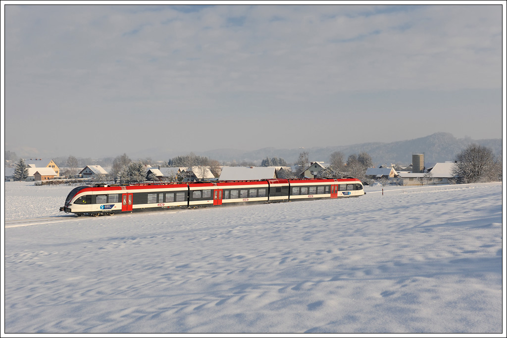 5063 004 als R 8570 von Wies-Eibiswald ber Lieboch nach Graz-Hbf. am 18.12.2010 kurz vor der Haltestelle Dietmannsdorf aufgenommen.