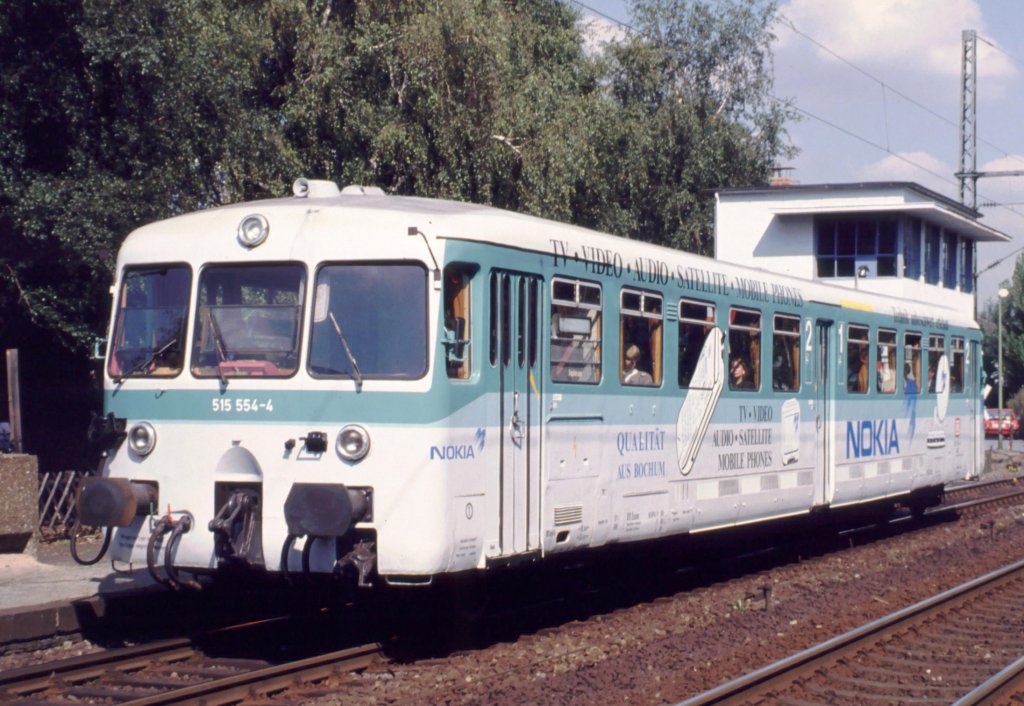 515 554-4 Bochum Hbf, August 1993 mit Nokia-Werbung