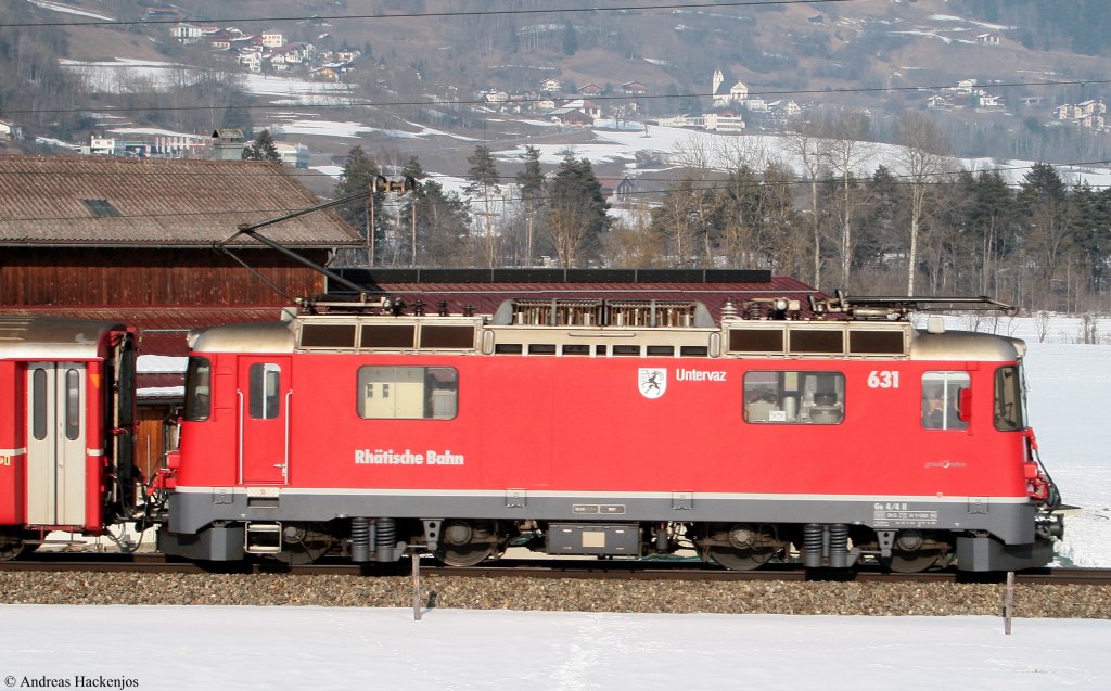 631 der Rhb mit dem RE 1253 (Disentis/Muster-Scuol-Tarasp) bei Ilanz 14.2.10