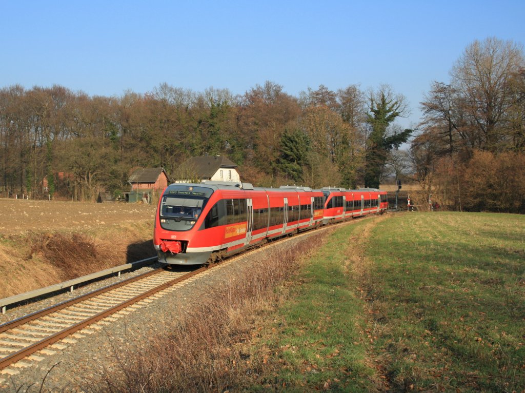 643 067 erreicht mit 643 xxx als RB63 nach Coesfeld in krze den Bahnhof Lutum.
Lutum, 03.03.2011