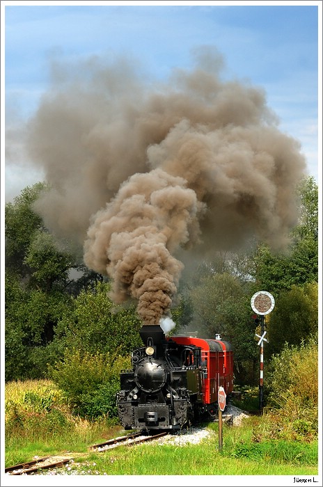 764.411R mit dem Stainzer Flascherlzug kurz nach Preding; 11.9.2010.