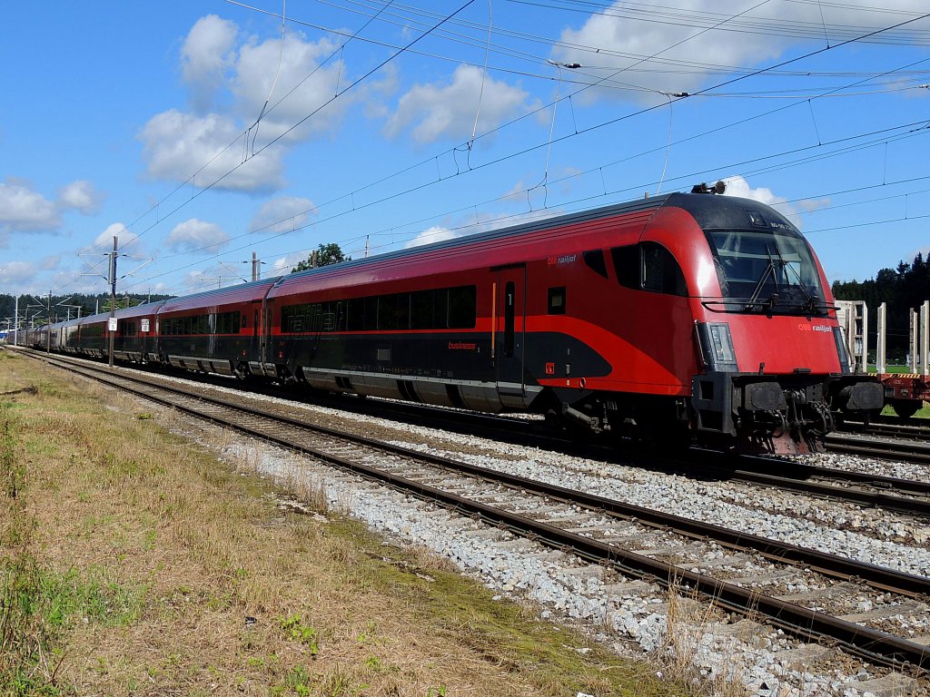 80-90-724 braust als RJ663 powered by Neue Mittelschule seinem nchsten Stop Linz-Hbf. entgegen; 120807