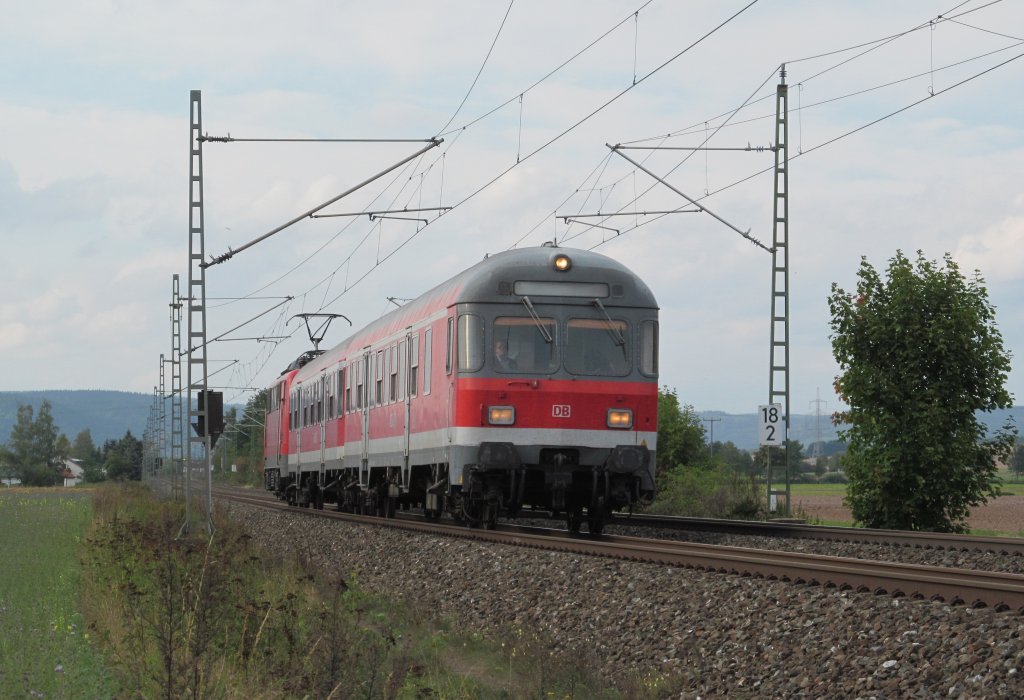 82-34 211 an der Spitze einer Regionalbahn von Pressig-Rothenkirchen nach Bamberg am 18. September 2012 bei Kronach.