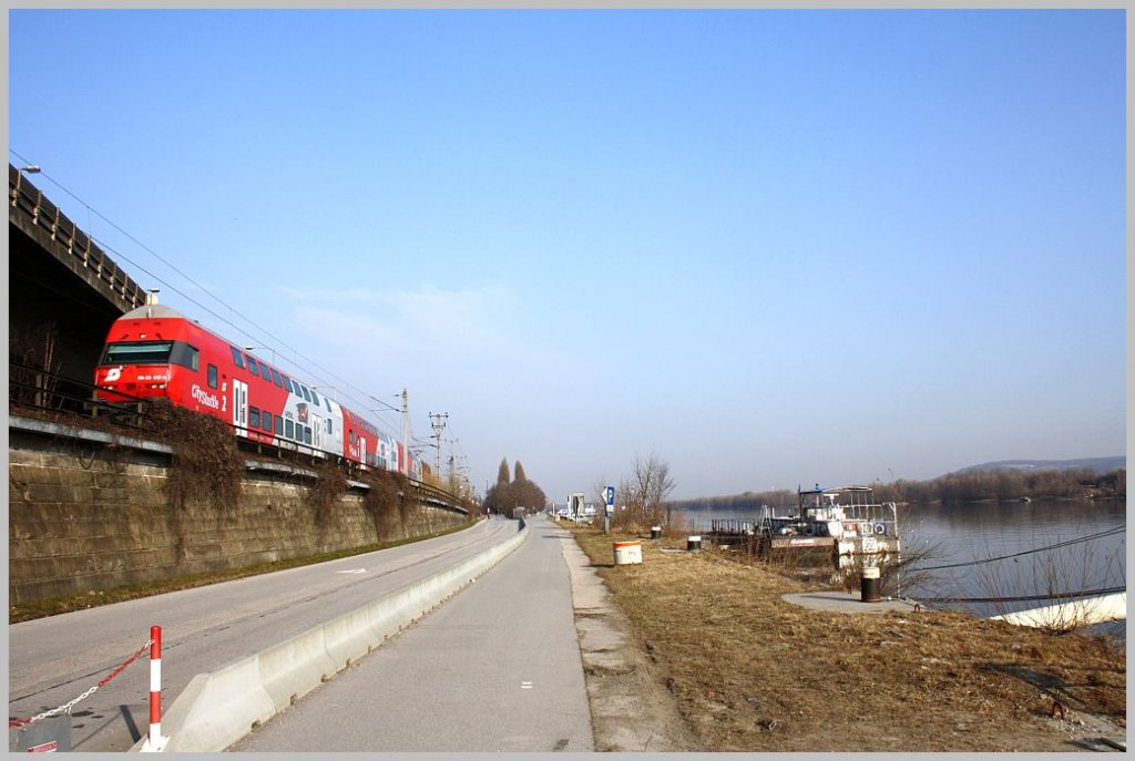 86-33 017-3 im REX-Planeinsatz auf der Franz-Josefs Bahn in Wien/Nudorf; 09.03.11