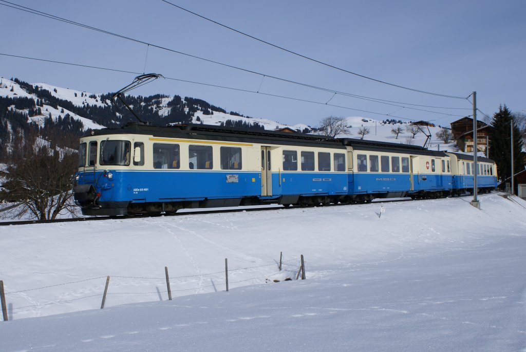 ABDe 8/8 4001 fhrt am 16.1.10 von Gruben Richtung Gstaad.
