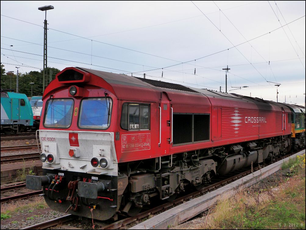 Abgestellt an der alten Laderampe im Aachener Westbahnhof steht die DE 6301 Class 66
der Crossrail Benelux im September 2012.