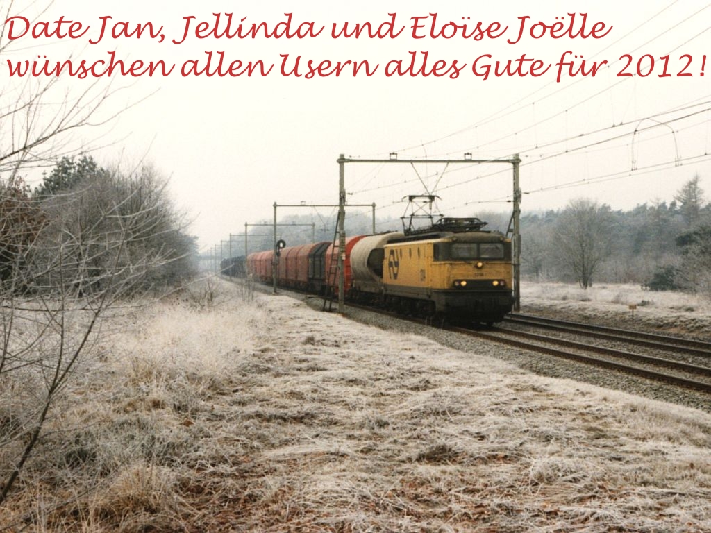 Alles gute fr 2012 und Frohe Weihnachten! Zum Bild:1314 mit Gterzug 45121 Beverwijk-Hagen Vorhalle bei Ginkel am 27-1-1997. Bild und scan: Date Jan de Vries.