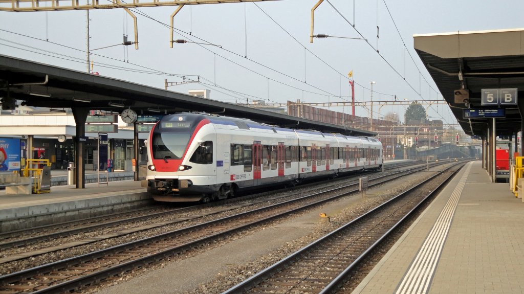 Als S1 nach Baar steht der RABe 523 009-9 am 09.04.10 in Rotkreuz und wartet berholungen ab.