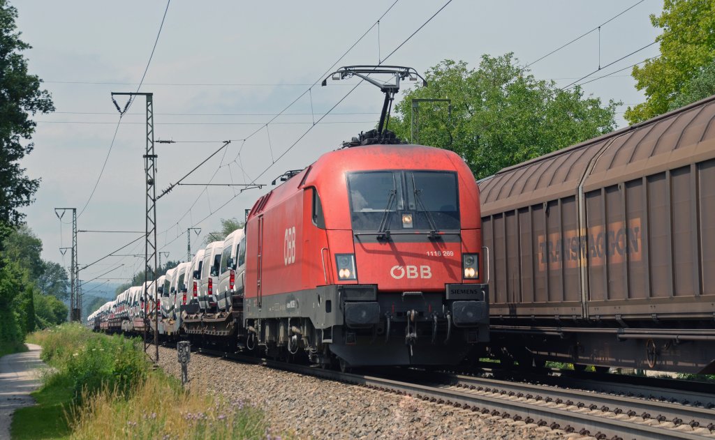 Am 02.07.12 zog 1116 269 einen mit Transportern beladenen Ganzzug durch Freilassing Richtung Salzburg.