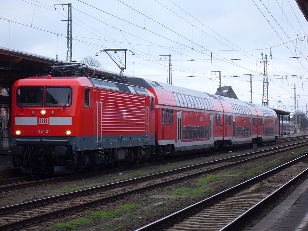 Am 12.03.2012 fuhr 112 131 die RE 20 von Halle->Magdeburg-> Stendal->Salzwedel nach Uelzen in Stendal zur Abfahrt bereit.