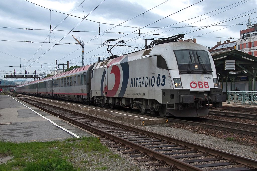 Am 12.05.2013 kam die 1116 264  Hitradio �3  wieder einmal in den Wiener Raum. Hier mit dem OIC 543 in Wien Penzing.
