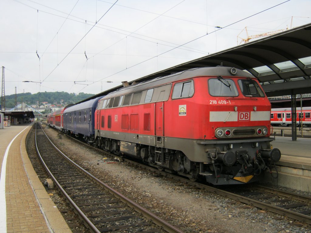 Am 14.08.2010 ist gerade 218 409-1 mit ihrem IRE aus Lindau in den Ulmer HBF eingefahren.