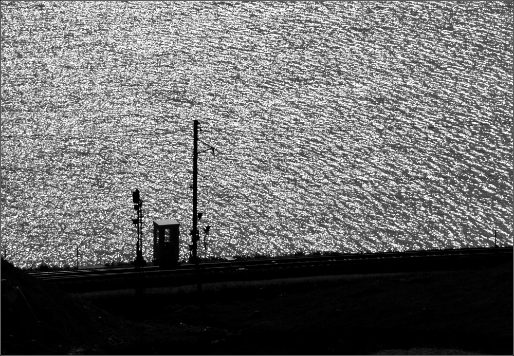 Am Lago Bianco (II).

Die starke Thermik sorgt fr ein beeindruckendes Schattenspiel mit dem Sonnenlicht. Im Juli 2013.
