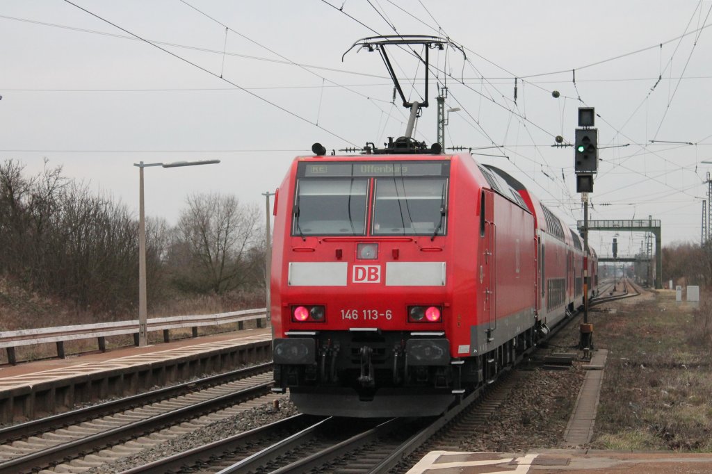 Ausfahrt von 146 113-6 am 16.03.2013 in Orschweier. Die 146 113 ist die letzte 146.1 vom BW Freiburg, die noch keine neue Baden-Wrttemberg Ticket Werbung hat und ist deswegen ein kleiner Sonderling im Raum Freiburg.
