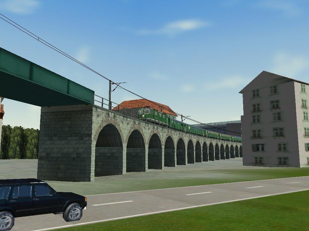 Ausfahrt aus Zug richtung Arth Goldau eines RE mit Re 4/4...