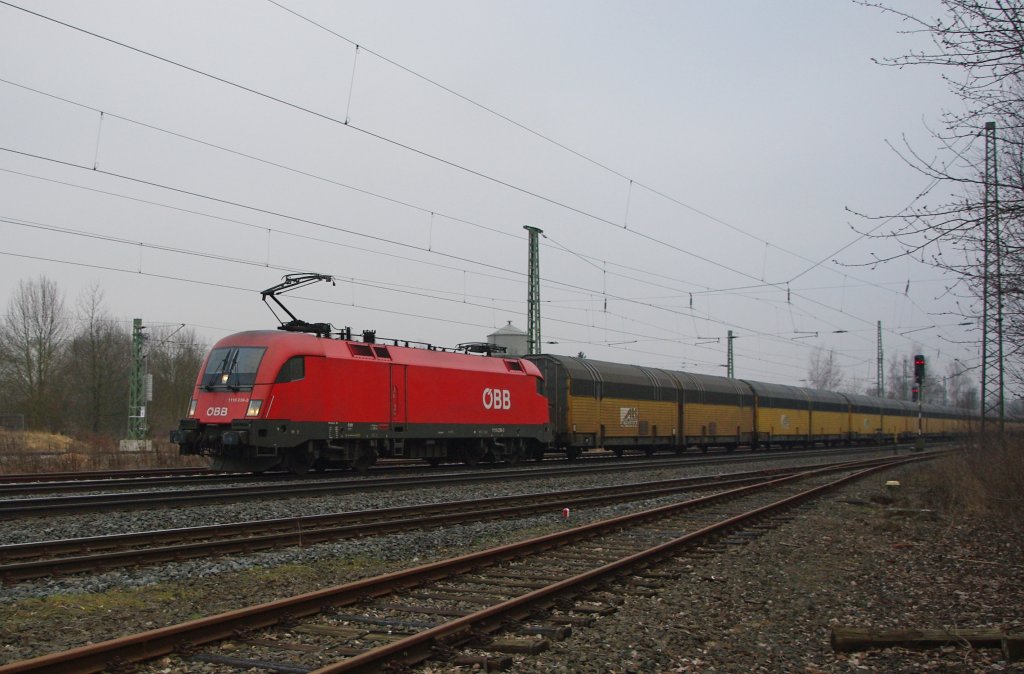 BB 1116 239-3 mit ARS-Autozug Zug in Fahrtrichtung Norden. Aufgenommen am 01.02.2011 in Eschwege West.