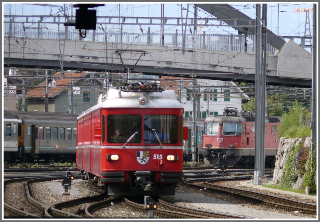 Be 4/4 515 und Re 4/4 II 11226 in Chur. (05.09.2010)