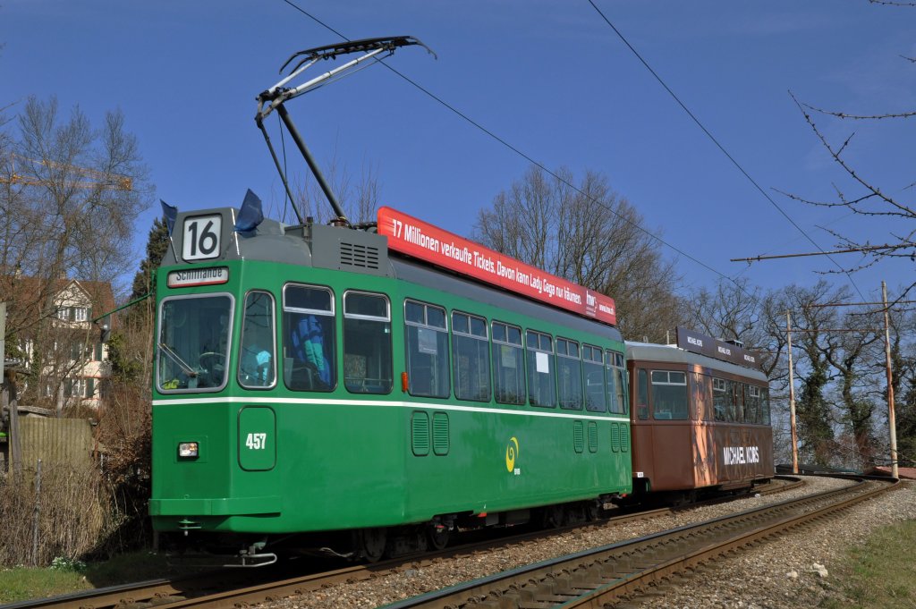 Be 4/4 mit der Betriebsnummer 457 und der B4 1490 und der Vollwerbung fr den Designer Michael Kors fhrt zur Haltestelle Jakobsberg auf der Linie 16. Die Aufnahme stammt vom 12.03.2012. 