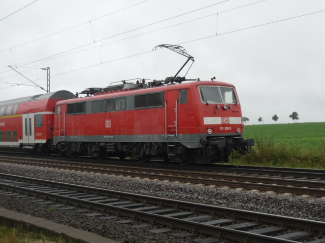 BR 111 091-5 fhrt als RE nach Rheine durch Timmerlah.
