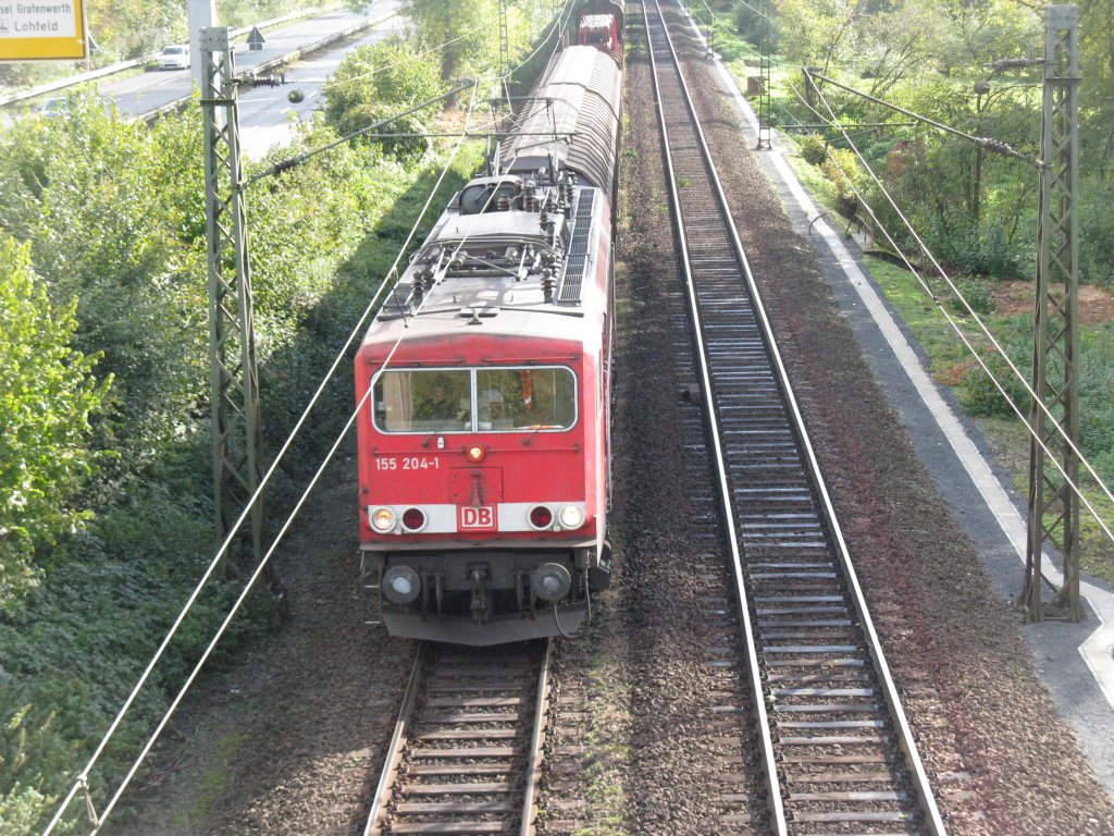 BR 155 204-1 kommt mit einem gemischten Gterzug fhrt durch Bad Honnef auf der Strecke Koblenz-Kln.
am 20.10.2010