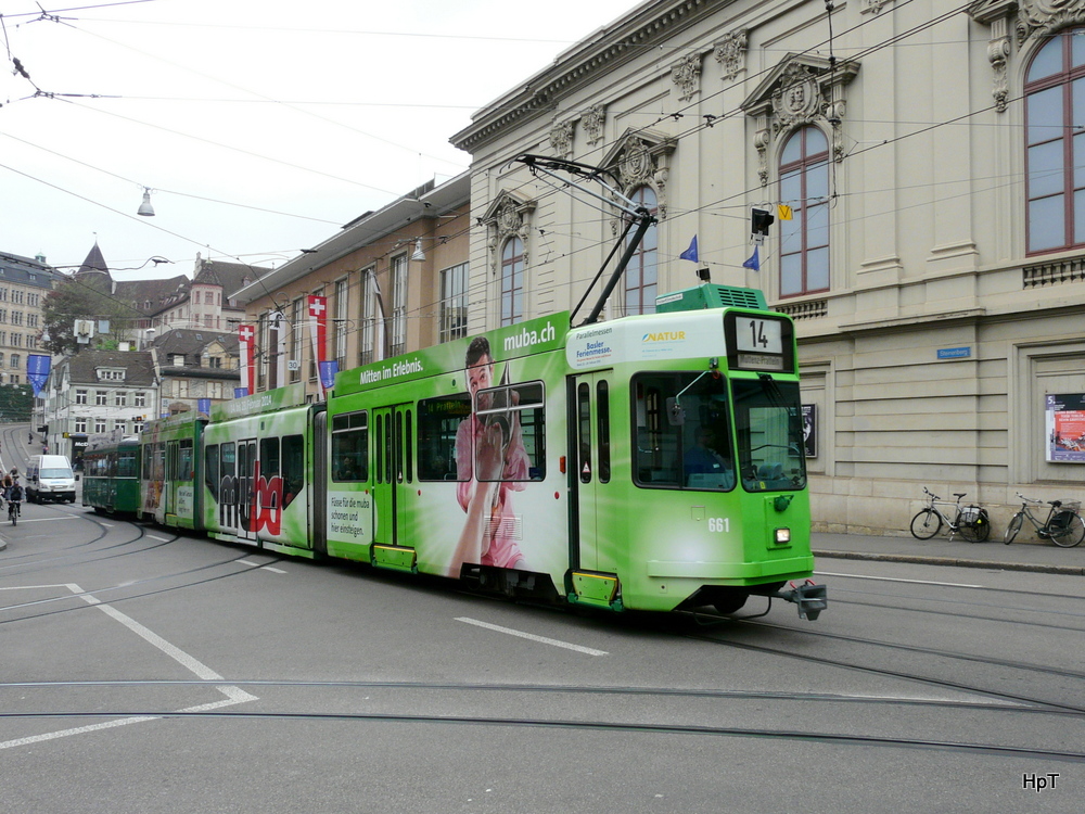 BVB - Tram Be 4/8 661 mit Werbung und mit Tramanhnger unterwegs in Basel am 02.05.2013