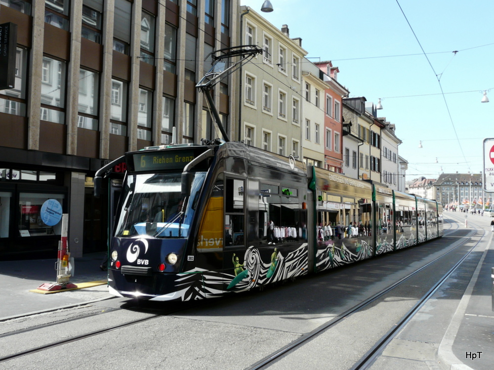 BVB - Tram Be 6/8 303 mit Werbung unterwegs auf der Linie 6 in Basel am 04.05.2012