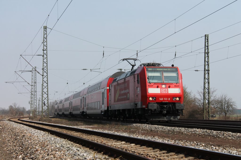 Ca. 1 Stunde spter zog 146 112-8 nun einen RE nach Basel Bad Bf. Hier bei der Einfahrt in Orschweier.