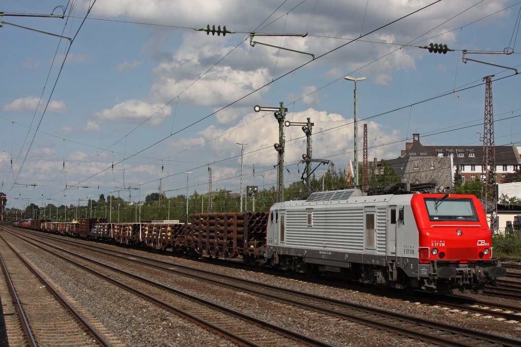 CBRail E37 518 am 29.8.12 mit einem Rhrenzug bei der Abfahrt in Dsseldorf-Rath.