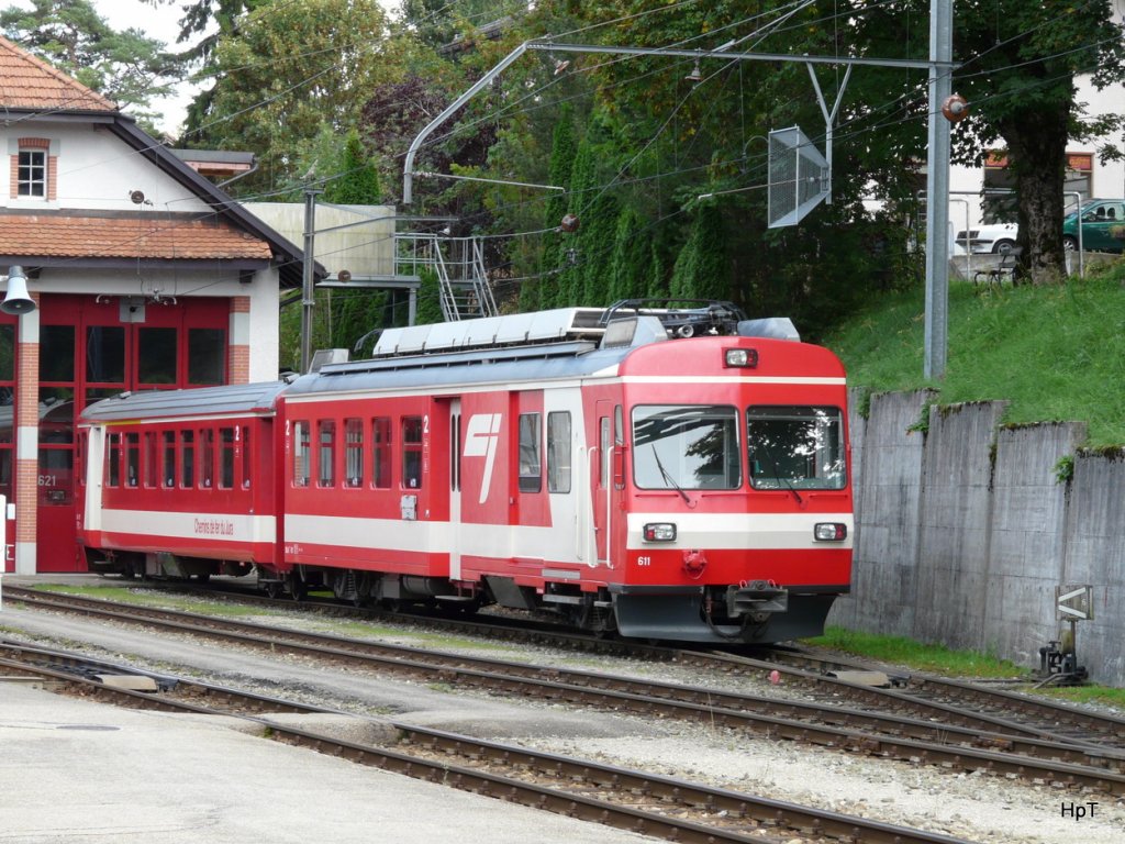 CJ - Triebwagen BDe 4/4 611 und Steuerwagen ABt abgestellt vor dem Depot in Tramelan am 05.09.2009